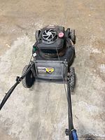 Top view of Craftsman Platinum self-propelled lawn mower showing deck, engine cover, pull handle, and wheels