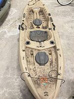 Full top view of tan Lifetime sit-on-top kayak showing storage hatches and deck features