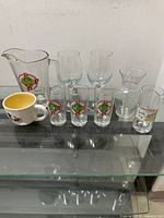 All pieces on glass shelf for overview