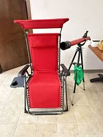 Zero-gravity lounge chair and telescope overview
