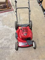 Top view of red Toro GTS Recycler push mower showing full mower and handle