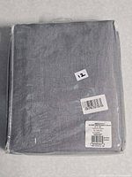 Front view of sealed curtain panel package