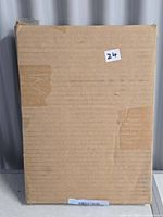 Sealed cardboard package containing the canvas print