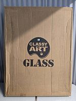 Sealed Classy Art shipping carton for two frames