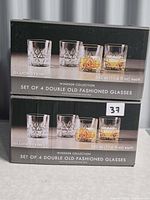 Front view of two Windsor Collection boxes showing product image and capacity