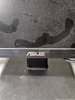 Front lower bezel showing Asus logo and screen surface