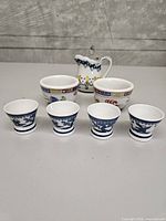 Group shot of all seven porcelain items