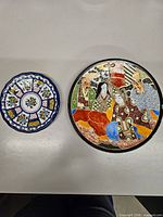 Both plates side by side showing overall designs and relative sizes