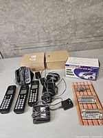 All items overview: phone components, hooks package, cardboard boxes