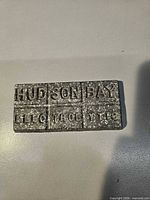 Front of lead bar showing HUDSON BAY ELECTROLYTIC lettering