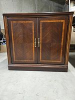 Front view of Lane wooden cabinet closed