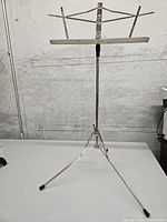 Full view of folding music stand fully extended