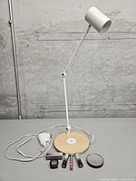 Overall view showing lamp, adapter, mirror, and makeup items