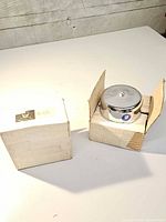Both boxed chrome parts showing size and packaging