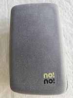 closed grey textured carrying case with no!no! logo