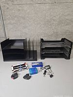 Overall view showing letter sorter, letter tray and assorted small office supplies