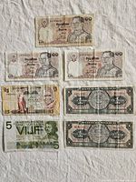 Fronts of all seven banknotes laid out