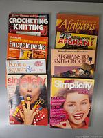 All eight craft books laid out front covers visible