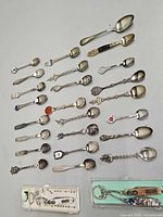 All spoons and boxed keychains laid out
