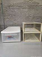 Sterilite ClearView drawer beside two ivory modular drawers