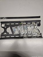 Wall bracket, support bar, sealed hardware bags