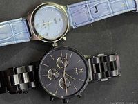 Both watches side by side showing overall style and straps
