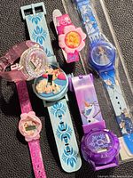 Group shot showing all six Disney kids wristwatches