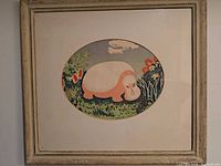 Entire framed "Hippo" print on wall showing frame, mat, and artwork