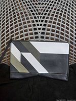 Front view showing geometric colorblock design