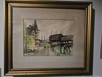Full view of framed watercolor print in gold frame