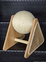 front view showing wood frame, jute rope ball and triangular sisal pad