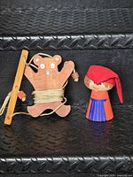 Both wooden toys displayed together