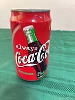 Coca-Cola can-shaped electric pencil sharpener showing branding and condition