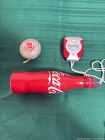 Bottle, yo-yo and electronic gadget overview