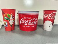 Front view showing all three Coca-Cola items and graphics