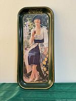 Front view of tray showing advertising artwork and Coca-Cola logo