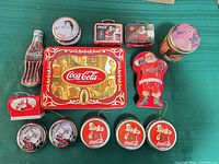 Group shot showing all Coca-Cola tins laid out