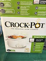 Retail box showing Crock-Pot Smart-Pot 6-qt slow cooker image and specs