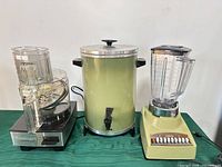 Overall shot showing Cuisinart food processor, West Bend beverage urn and Sunbeam blender