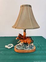 Full view of lamp with shade, cord visible