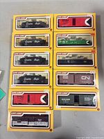 Ten Life-Like boxed freight cars arranged in two columns