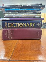 Stack of books showing spines and titles