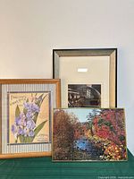 Front view showing all three framed art pieces