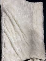 White faux-fur throw blanket texture