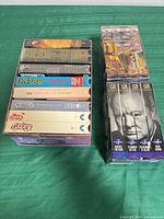 Two stacks of VHS tapes showing spines, titles visible
