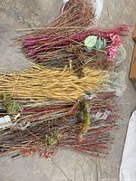 Assorted decorative stems laid out on floor showing all items