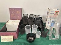 Entire lot showing brochure holder, mesh cups, storage box with cards