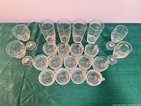 Overhead view of entire hammered glass set showing quantity and variety
