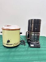 Both appliances side by side on table