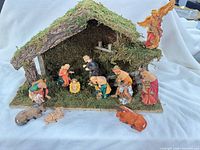 Full nativity set showing stable, all figures and animals